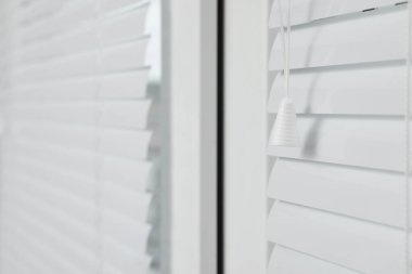 Closeup view of stylish horizontal window blinds