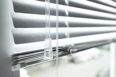 Closeup view of stylish horizontal window blinds