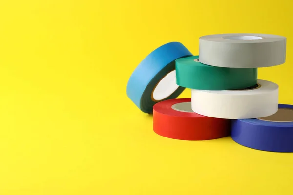Colorful Insulating Tapes Yellow Background Space Text — Stock Photo, Image