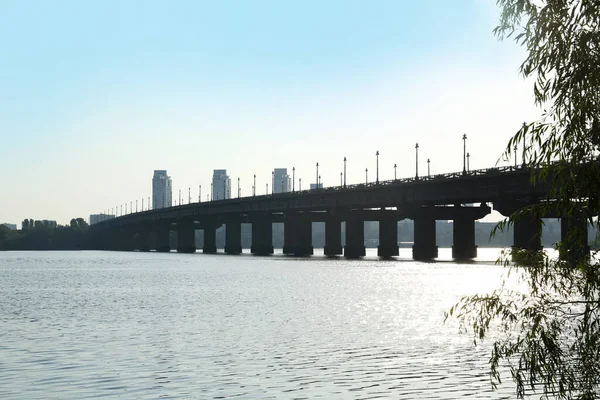 stock image Beautiful view of beam bridge over river on sunny day