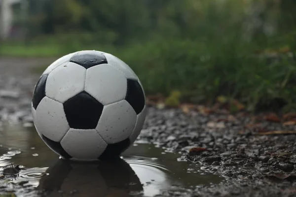 Leather Soccer Ball Puddle Outdoors Space Text — Stock Photo, Image