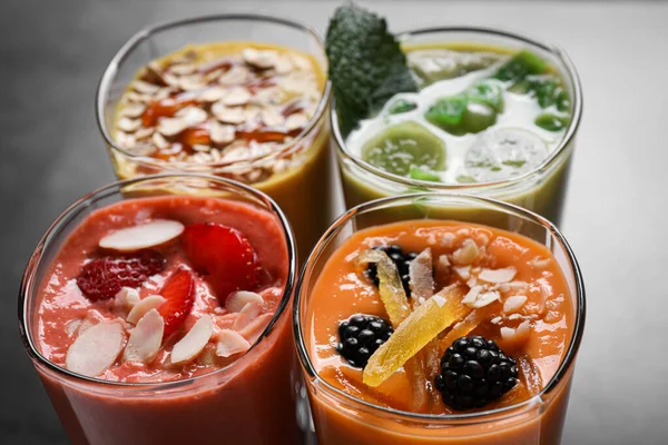 Many Different Delicious Smoothies Grey Table Closeup — Stock Photo, Image