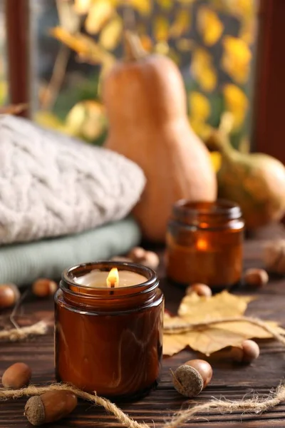 Burning Scented Candles Warm Sweaters Acorns Wooden Table Window Autumn Royalty Free Stock Images