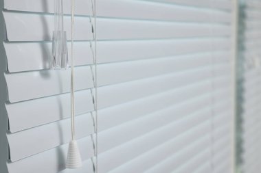 Closeup view of stylish horizontal window blinds