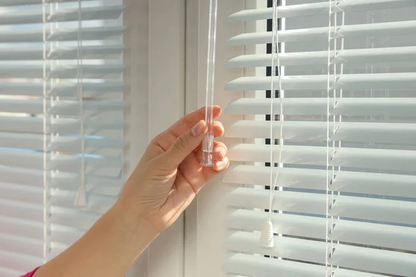 Woman Opening Horizontal Blinds Window Indoors Closeup — Φωτογραφία Αρχείου