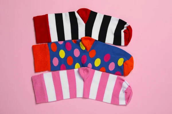 Different Colorful Socks Pink Background Flat Lay — Stock Photo, Image