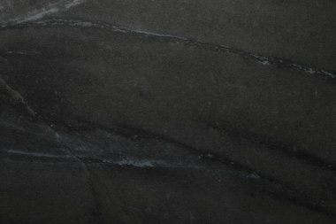 Arkaplan olarak siyah mermer yüzey, yakın görünüm