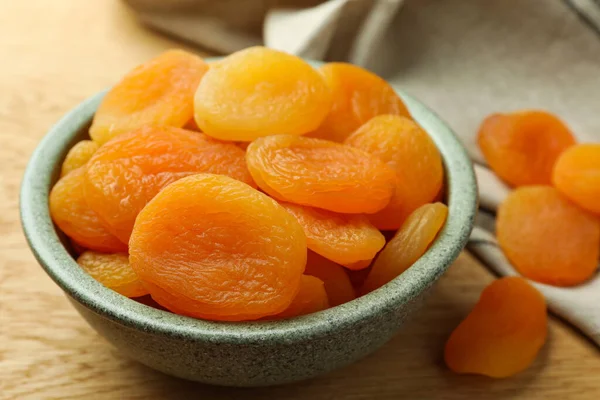 Bowl Tasty Apricots Wooden Table Closeup Dried Fruits — Stock Photo, Image