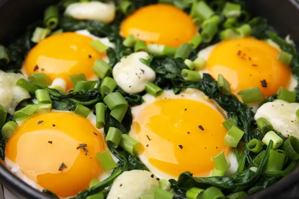 stock image Tasty green Shakshouka in frying pan, closeup