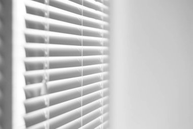 Closeup view of stylish horizontal window blinds