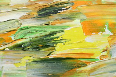 Beautiful strokes of colorful oil paints as background, closeup