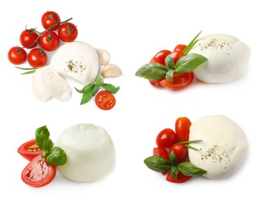 Lezzetli mozzarella, taze domates ve beyaz arka planda fesleğen.