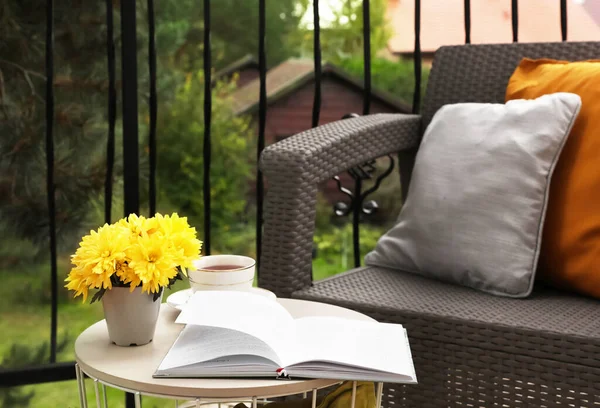 Different Pillows Book Beautiful Chrysanthemum Flowers Garden Furniture Outdoors — Stock Photo, Image