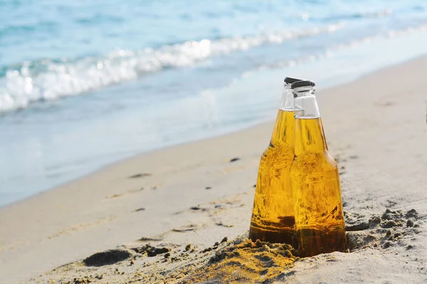 Bottles Cold Beer Sandy Beach Sea Space Text — Stock Fotó
