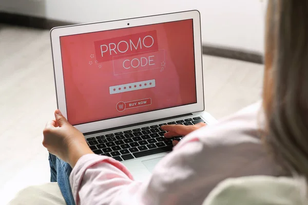 Woman Laptop Activating Promo Code While Doing Online Shopping Indoors — Stock Photo, Image