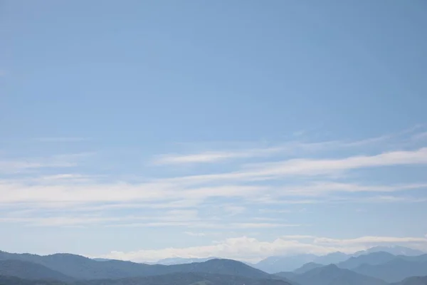 stock image Picturesque view of mountain landscape and blue sky with clouds