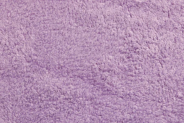 柔らかい淡い紫色のタオルを背景として トップビュー — ストック写真