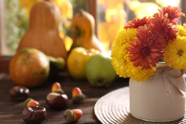 Beautiful Chrysanthemum Flowers Chestnuts Acorns Wooden Table Space Text Autumn — Stock Photo, Image