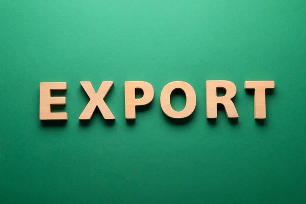Word Export Hecho Letras Madera Sobre Fondo Verde Plano —  Fotos de Stock