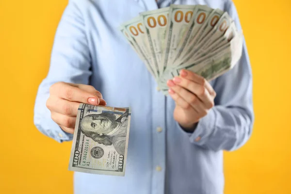 Woman Holding Dollar Banknotes Yellow Background Closeup Money Exchange Concept — Stock Photo, Image