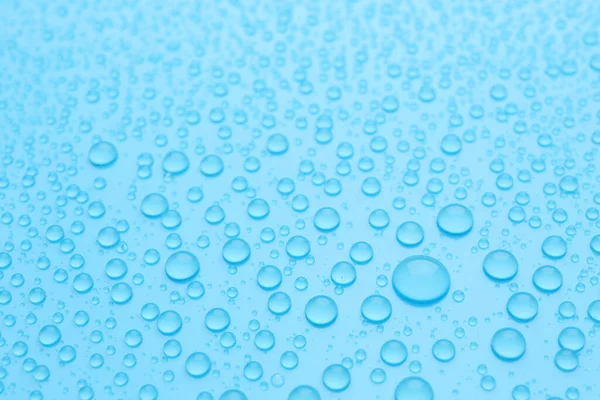 Waterdruppels Lichtblauwe Achtergrond Close Upzicht — Stockfoto