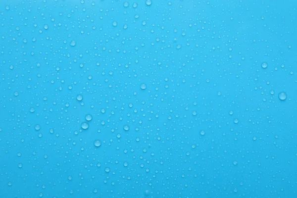 Σταγόνες Νερού Γαλάζιο Φόντο Πάνω Όψη — Φωτογραφία Αρχείου