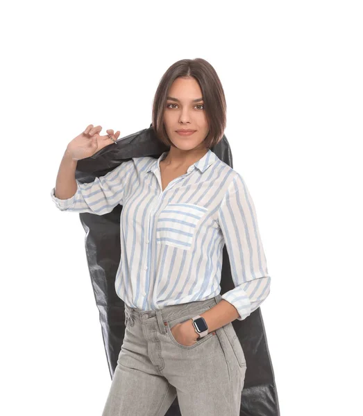 Woman holding garment cover with clothes on white background. Dry-cleaning service