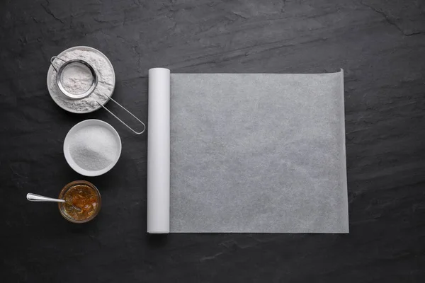 Roll Baking Parchment Paper Ingredients Black Slate Background Flat Lay — Stock Photo, Image