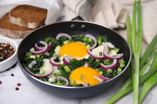 Stock image Tasty Shakshouka served on white marble table, closeup