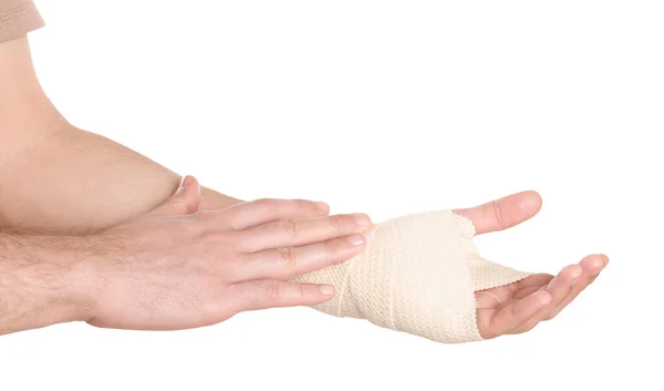 Mężczyzna Ręką Owinięty Bandaż Medyczny Białym Tle Zbliżenie — Zdjęcie stockowe
