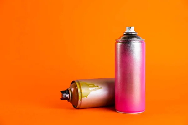 Used Cans Spray Paint Orange Background Space Text — Stock Photo, Image