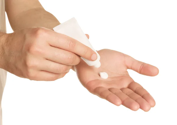 Man Applying Cream Hand White Background Closeup — Stok fotoğraf