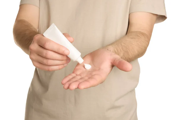 Man Applying Cream Hand White Background Closeup — Stok fotoğraf