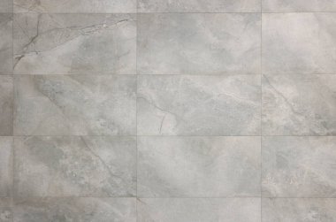 Arka plan olarak duvarın güzel gri mermer yüzeyi, yakın plan