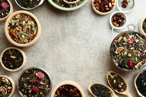Gri Masadaki Farklı Bitkisel Çayların Çerçevesi Düz Metin Için Boşluk — Stok fotoğraf