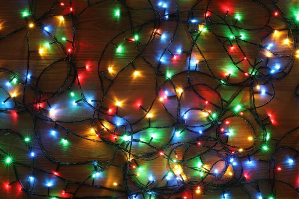 Luces Navidad Coloridas Mesa Madera Vista Superior —  Fotos de Stock