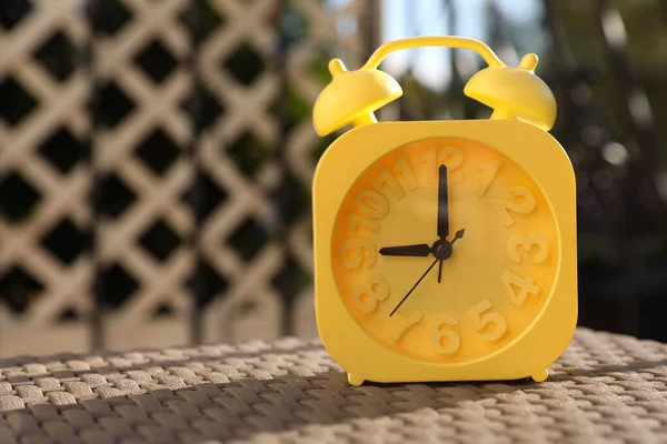 Yellow Alarm Clock Table Outdoors Sunny Morning Space Text — Stock Photo, Image