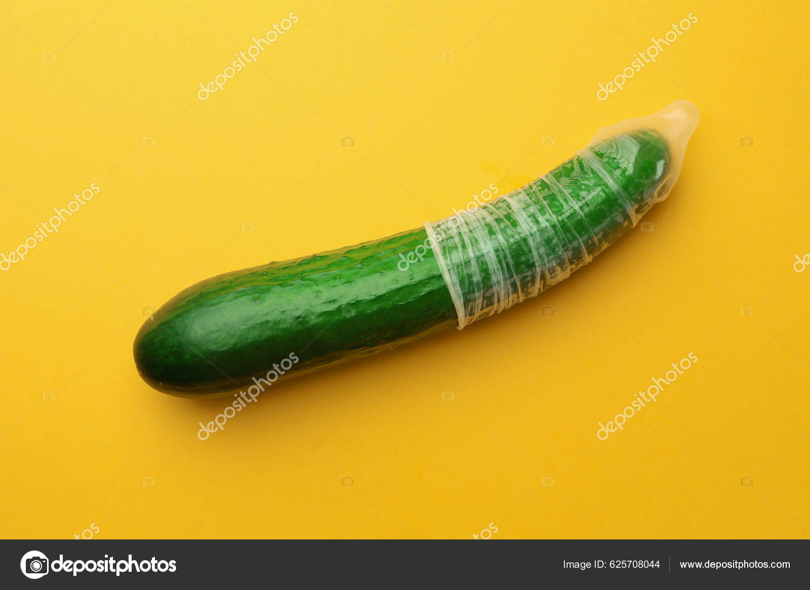 Cucumber Condom Orange Background Safe Sex Stock Photo by ©NewAfrica 625708044