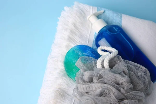 Measuring cup of laundry powder and clean towels on grey table against  light background. Space for text Stock Photo by ©NewAfrica 297700502