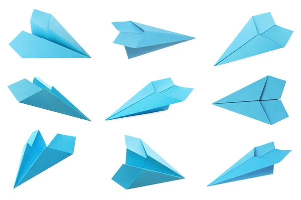 Set Met Handgemaakte Lichtblauwe Papieren Vliegtuigjes Witte Ondergrond — Stockfoto