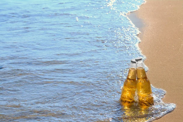 Bottles Cold Beer Sea Water Space Text — Stockfoto
