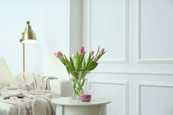 Beautiful Tulips Burning Candle White Table Indoors Interior Design — Stock Photo, Image