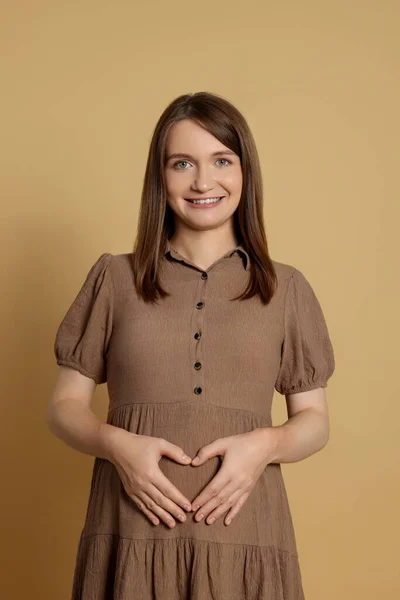 Happy Young Pregnant Woman Light Brown Background —  Fotos de Stock