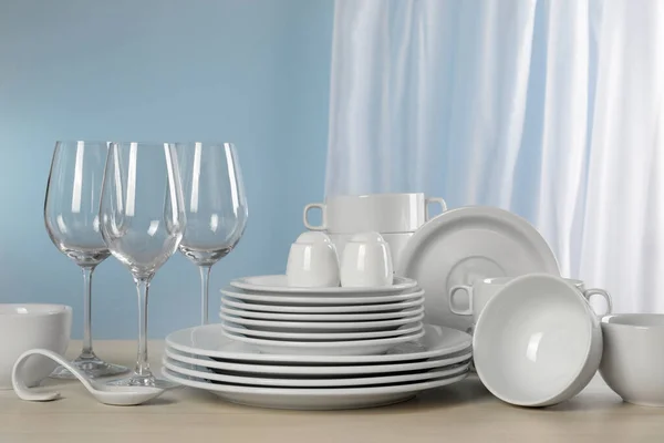 Set Clean Dishware Glasses Light Grey Table — Stock Photo, Image