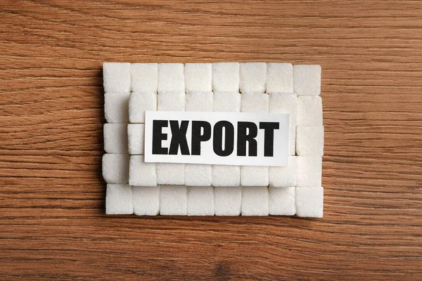 Cartão Com Palavra Exportação Muitos Cubos Açúcar Mesa Madeira Flat — Fotografia de Stock