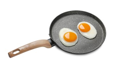 Tasty cooked chicken eggs in frying pan isolated on white clipart