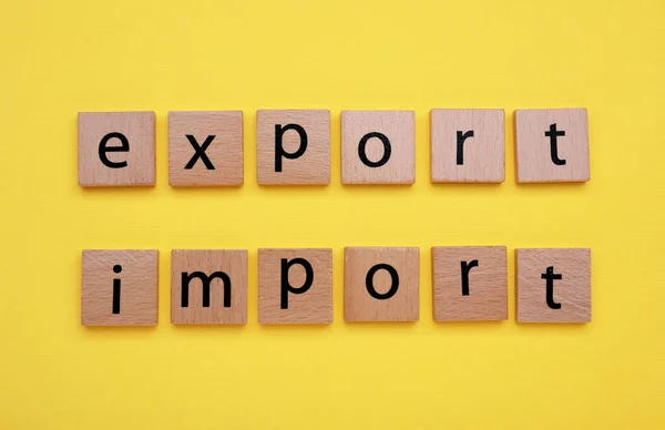 Palavras Importação Exportação Feita Quadrados Madeira Com Letras Sobre Fundo — Fotografia de Stock