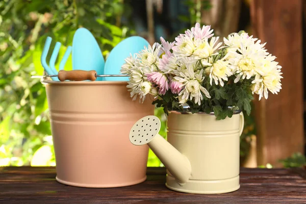 Watering Can Flowers Gardening Tools Wooden Table Outdoors — Stock Photo, Image