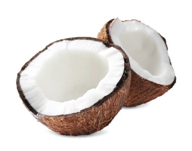 Halves of fresh ripe coconut on white background