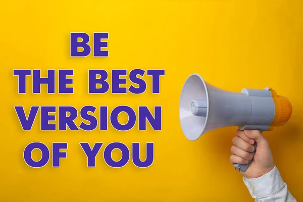 Man holding megaphone and phrase Be the Best Version of You on yellow background